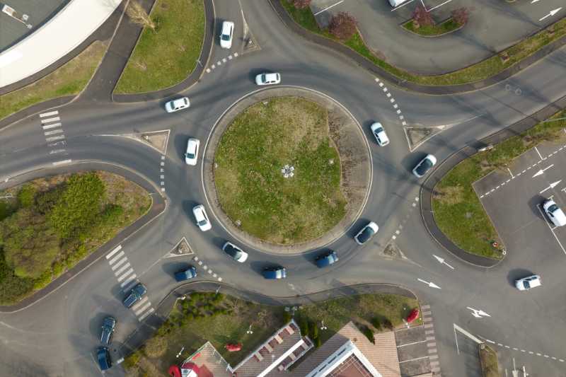 Aerial view of a road roundabout representing intersection accidents