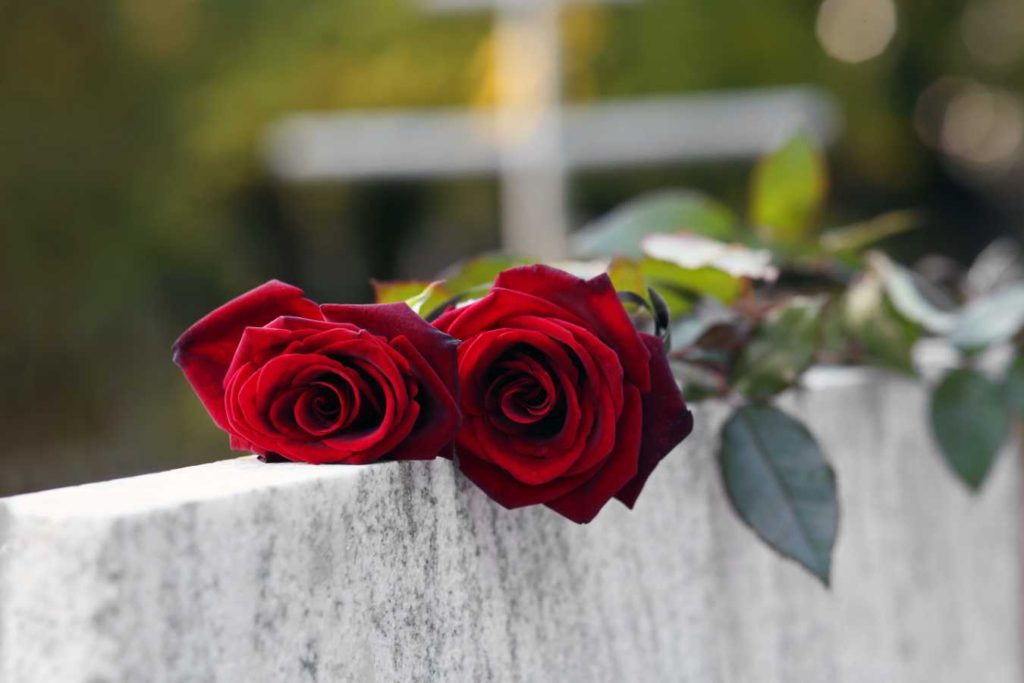 roses on a gravestone representing wrongful death