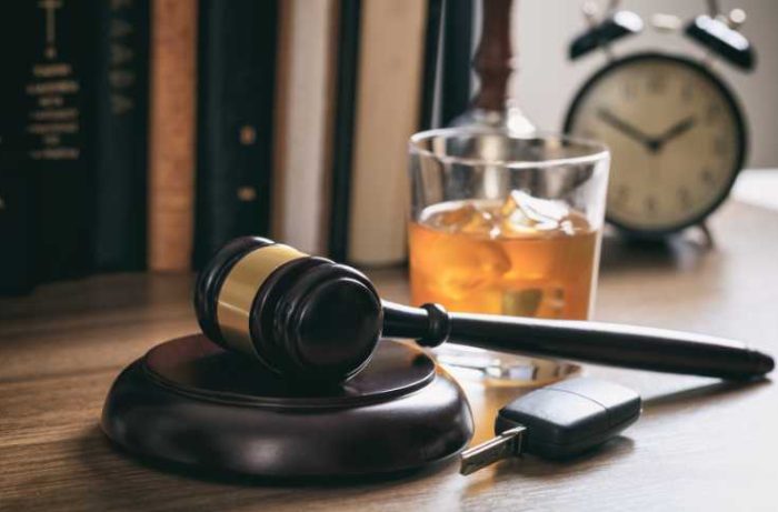 Gavel with drink representing DUI